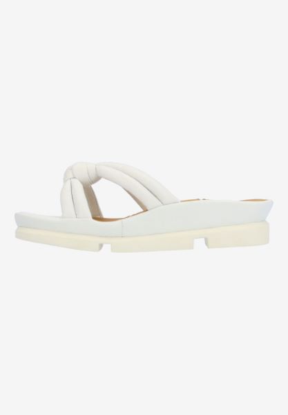 Left side view of Veda WHITE LAMBA
